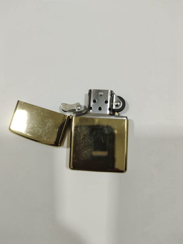WhatsApp-Image-2023-01-12-at-9.06.24-PM.jpeg Zippo Gold Classic Windproof Liquid Lighter - Image 1